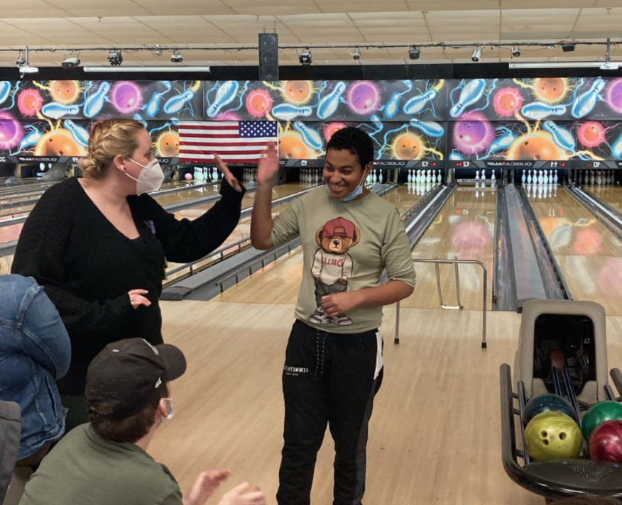 Student bowling at Special Olympics